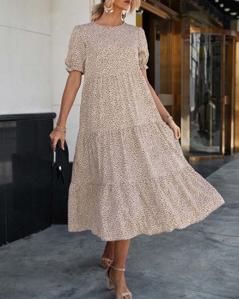 Dallas - Elegante jurk met een ronde halslijn en pofmouwen